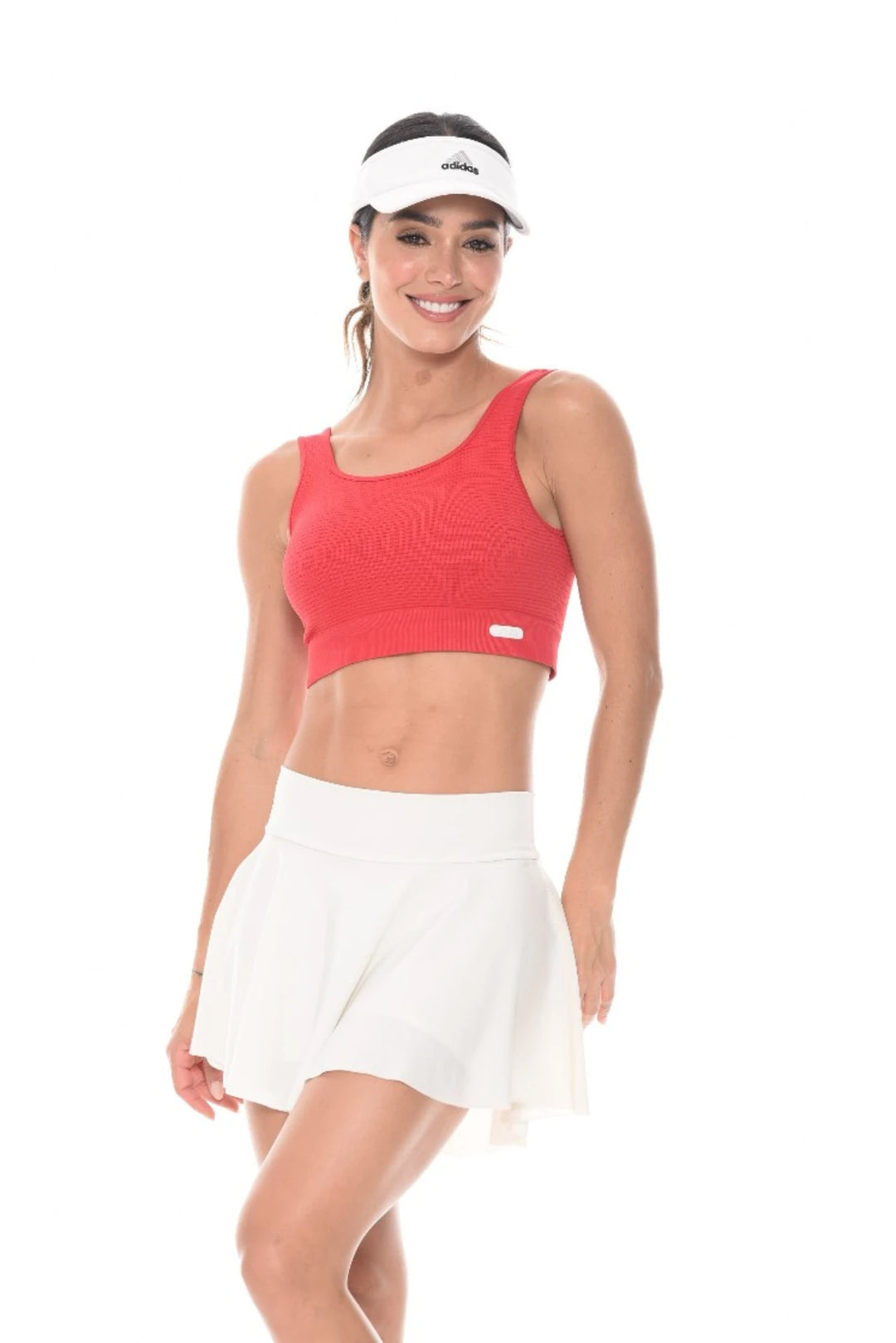 Falda short deportiva, fabricada con tecnología Secmax, que expulsa la humedad y acelera el secado, manteniéndote fresca incluso en los entrenamientos más intensos