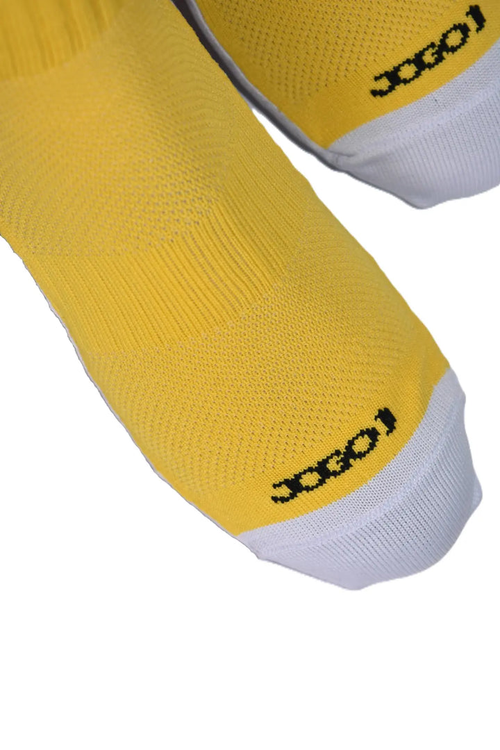 Medias canilleras antideslizantes amarillas