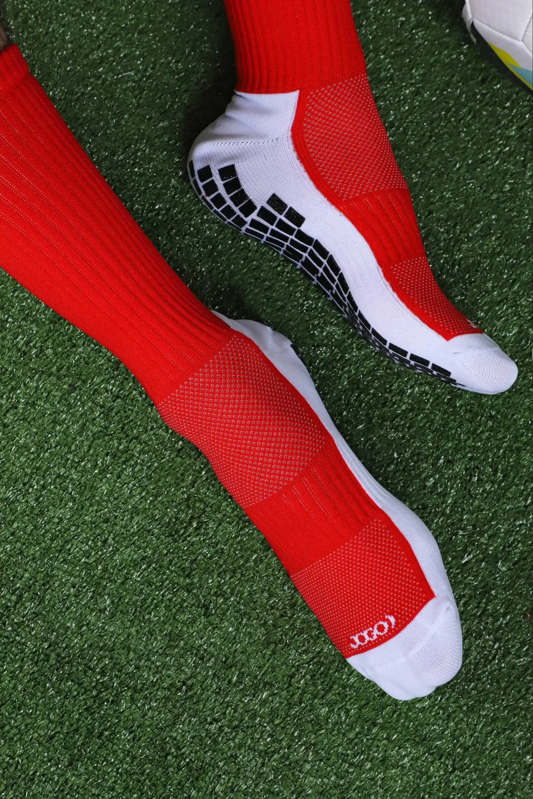 Medias canilleras antideslizantes rojas